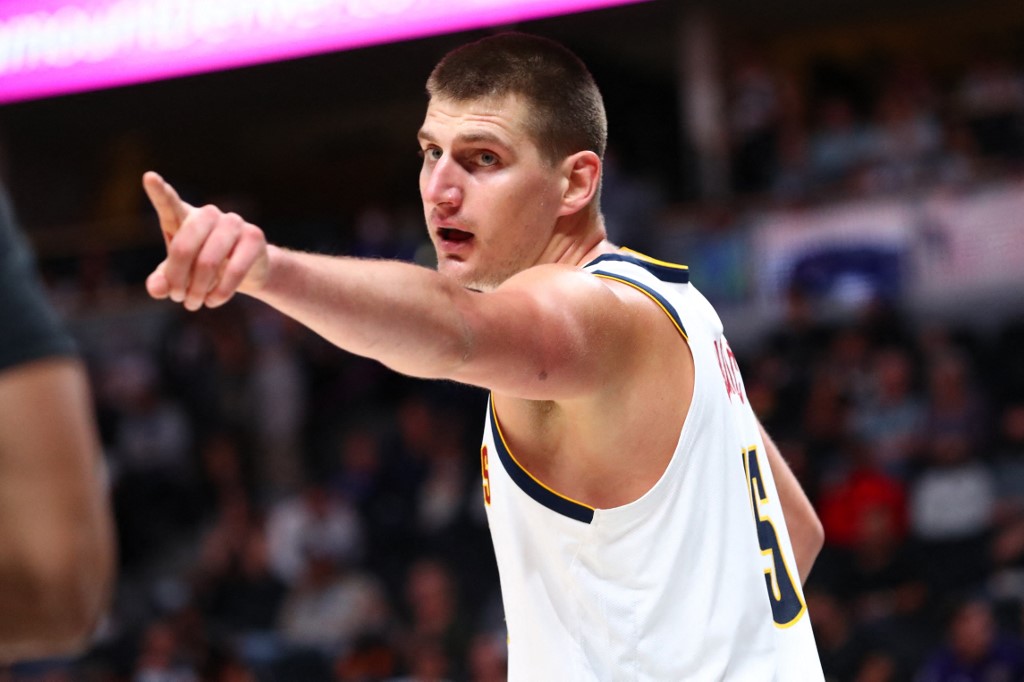 Nikola Jokic #15 of the Denver Nuggets reacts during the second quarter against the Minnesota Timberwolves at Ball Arena on October 8, 2021 in Denver, Colorado.