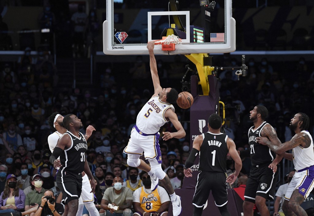 FILE – Talen Horton-Tucker #5 of the Los Angeles Lakers scores a basket against the Brooklyn Nets during a preseason basketball game at Staples Center on October 3, 2021 in Los Angeles, California.