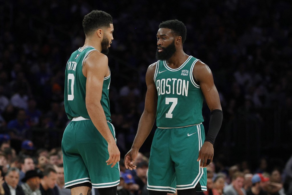 Jaylen Brown #7 talks with Jayson Tatum #0 of the Boston Celtics during the second half against the New York Knicks at Madison Square Garden on October 20, 2021 in New York City.