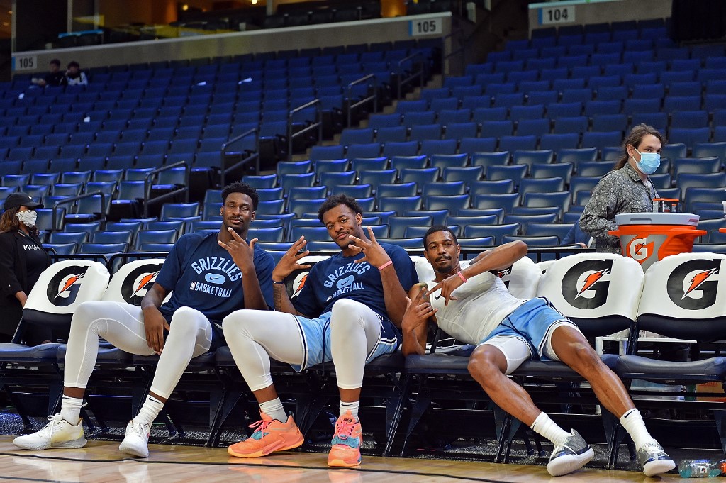  Jaren Jackson Jr. #13 of the Memphis Grizzlies, Xavier Tillman Sr. #2 and De'Anthony Melton #0 before the game against the Denver Nuggets at FedExForum on November 01, 2021 in Memphis, Tennessee. 