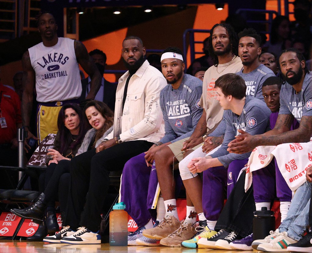  An injured LeBron James #6 of the Los Angeles Lakers watches from the bench during the first half against the Oklahoma City Thunder at Staples Center on November 04, 2021 in Los Angeles, California.   