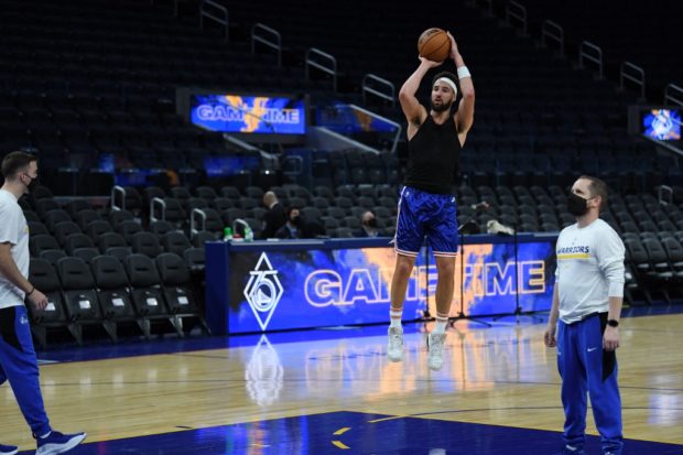 Klay Thompson #11f of the Golden State Warriors shoots around pregame at Chase Center on November 07, 2021 in San Francisco, California.