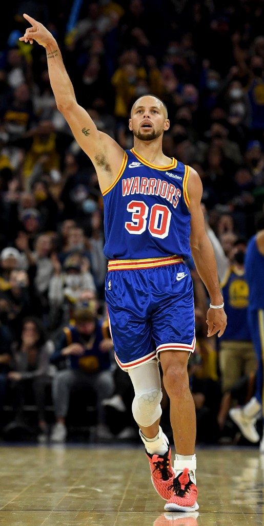 Stephen Curry #30 of the Golden State Warriors reacts after a shot against the Houston Rockets at Chase Center on November 07, 2021 in San Francisco, Californi