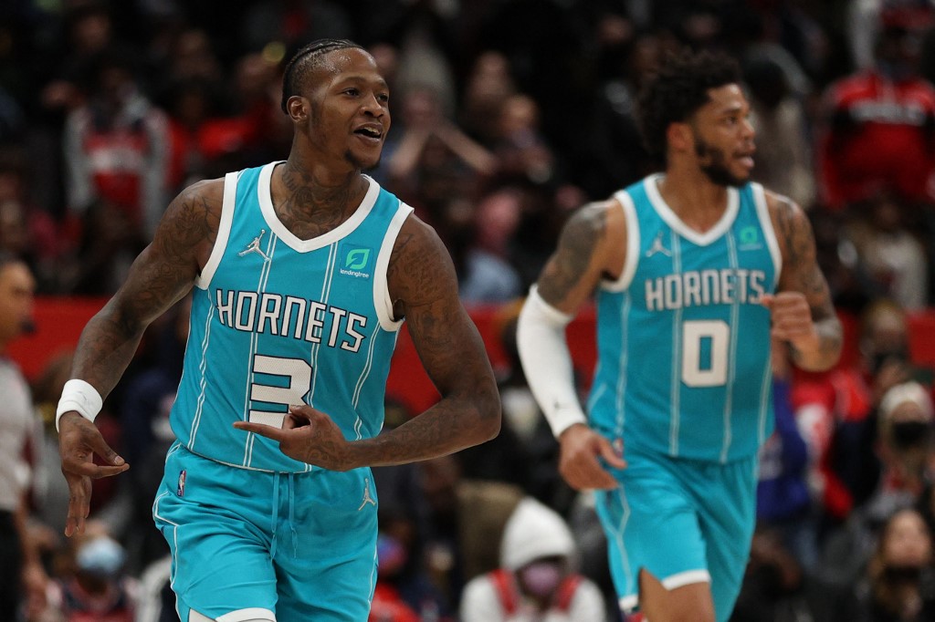Terry Rozier #3 of the Charlotte Hornets celebrates a three-pointer against the Washington Wizards during the fourth quarter at Capital One Arena on November 22, 2021 in Washington, DC.