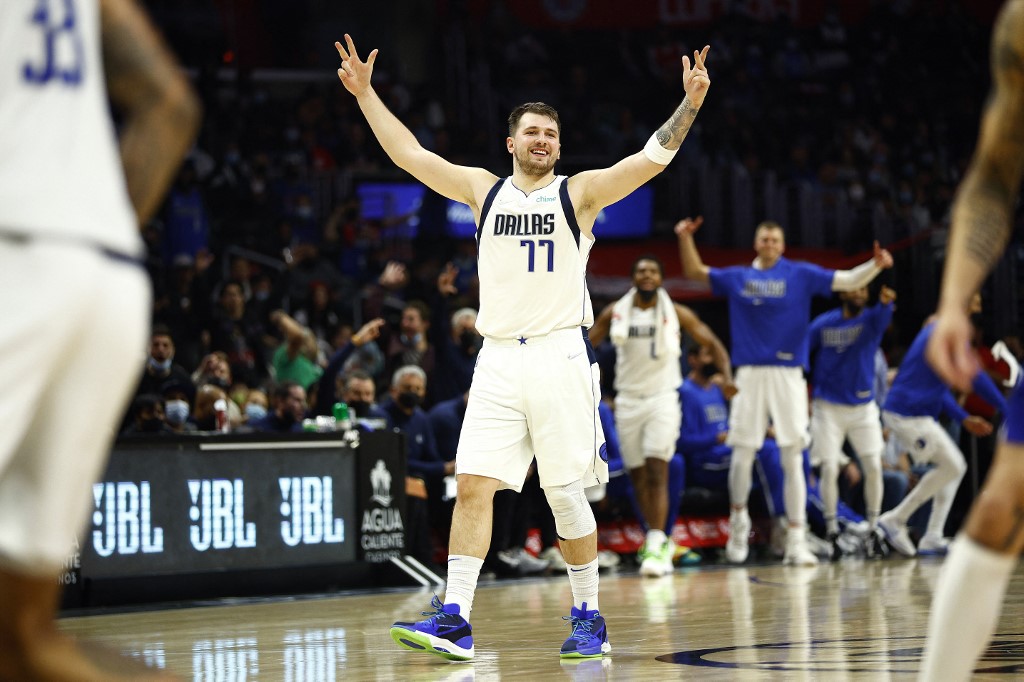  Luka Doncic #77 of the Dallas Mavericks reacts during the second half of a game against the LA Clippers at Staples Center on November 23, 2021 in Los Angeles, California. 