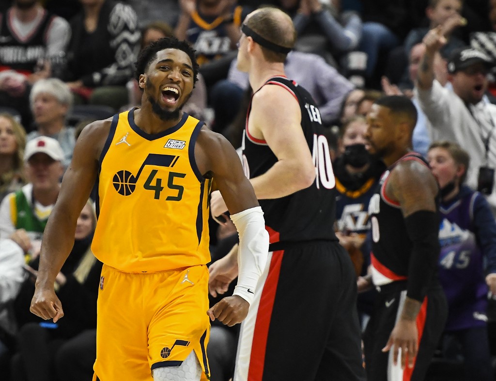 Donovan Mitchell #45 of the Utah Jazz celebrates a dunk in the second half during a game against the Portland Trail Blazers at Vivint Smart Home Arena on November 29, 2021 in Salt Lake City, Utah