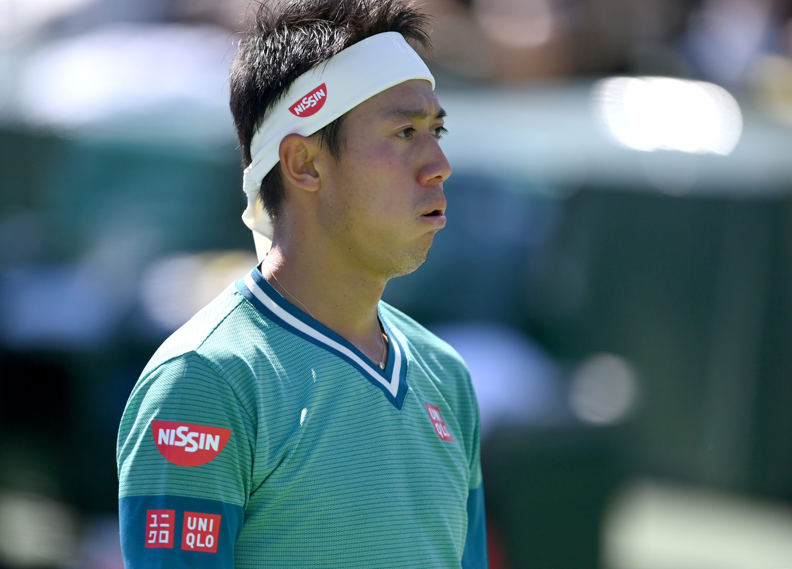 Kei Nishikori (JPN) looks on during his second round match against Daniel Evans (GER) during the BNP Paribas Open at the Indian Wells Tennis Garden. 