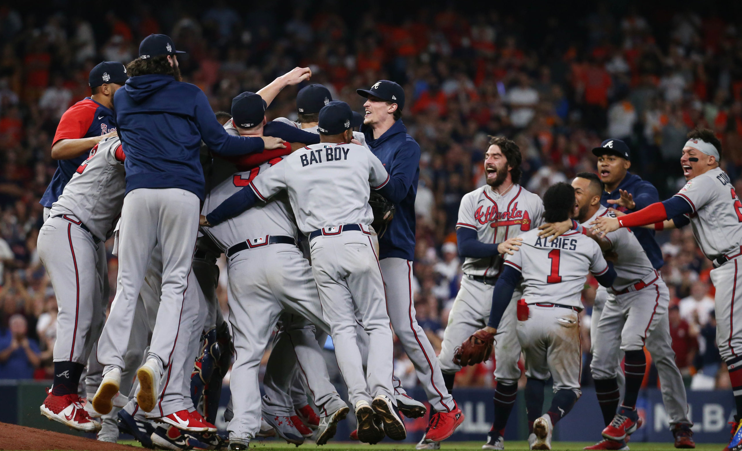  Atlanta Braves players celebrate after defeating the Houston Astros in game six of the 2021 World Series at Minute Maid Park.