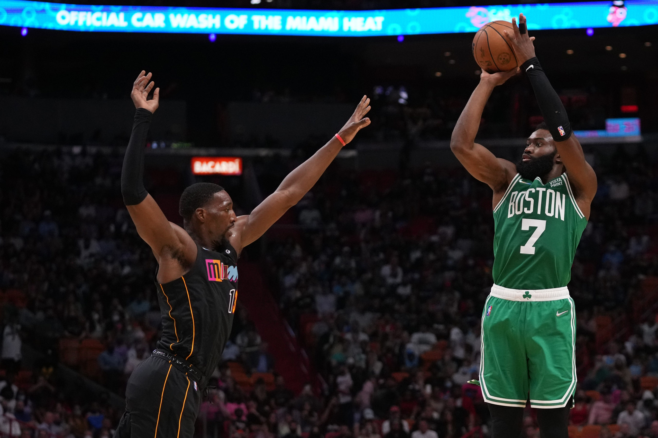 Boston Celtics guard Jaylen Brown (7) shoots over Miami Heat center Bam Adebayo (13) during the second half at FTX Arena.