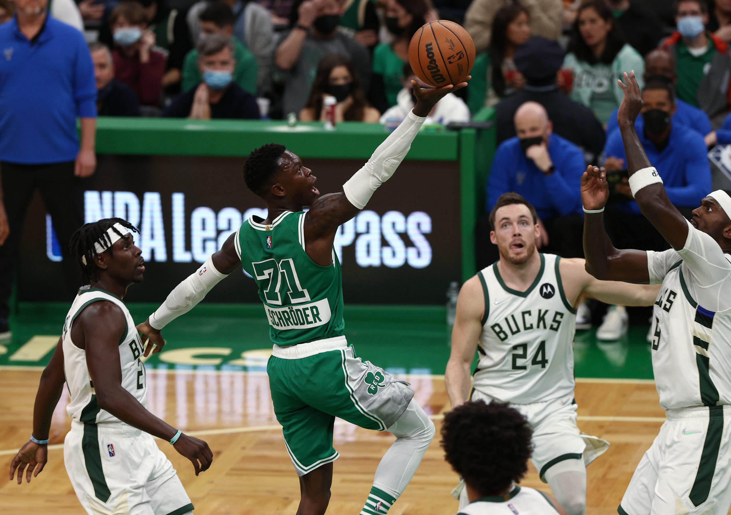 Boston Celtics guard Dennis Schroder (71) drives against the Milwaukee Bucks during the first quarter at TD Garden. Mandatory Credit: Winslow 