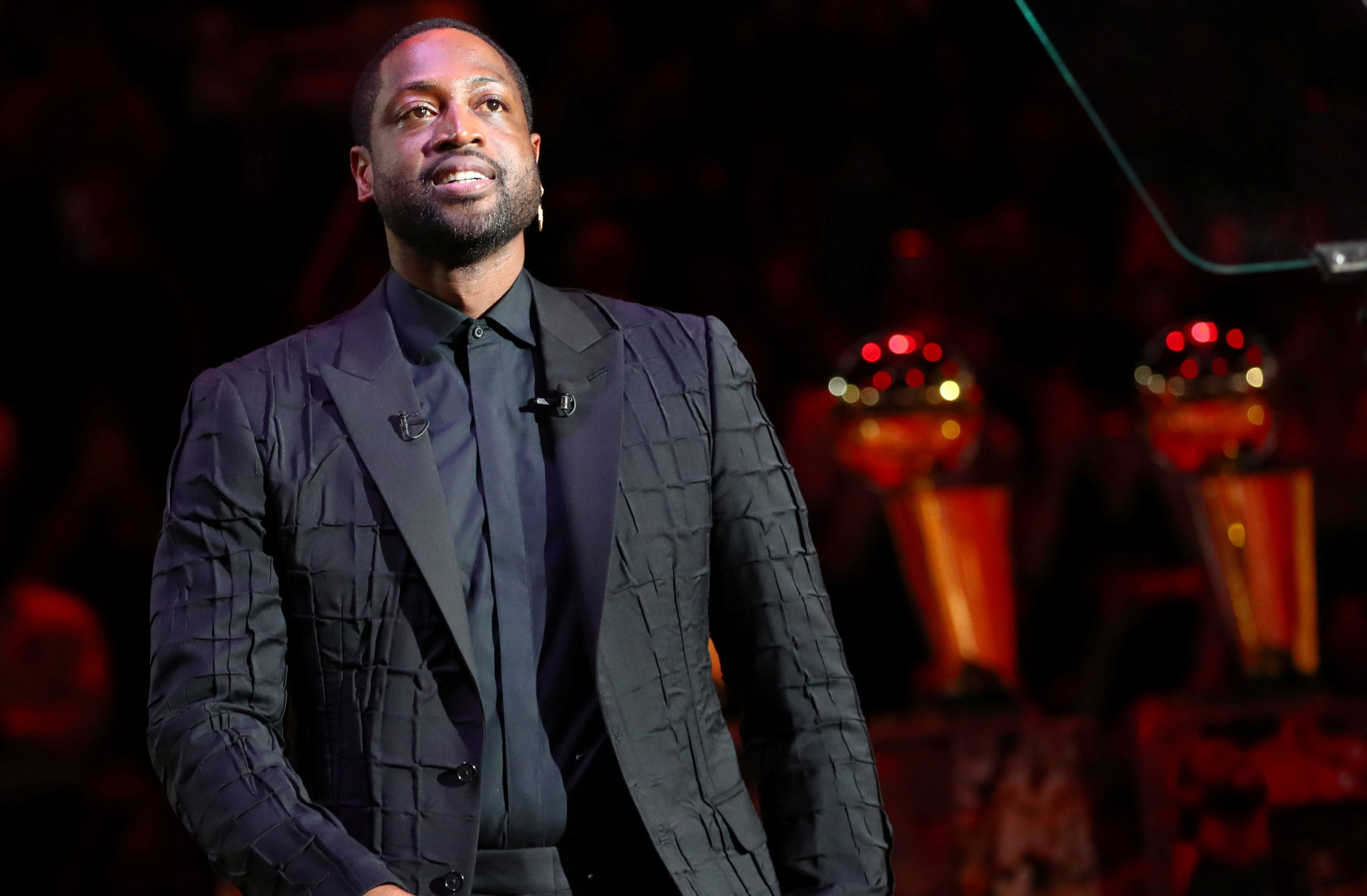 FILE–Miami Heat former player Dwyane Wade reacts during his jersey retirement celebration at American Airlines Arena.