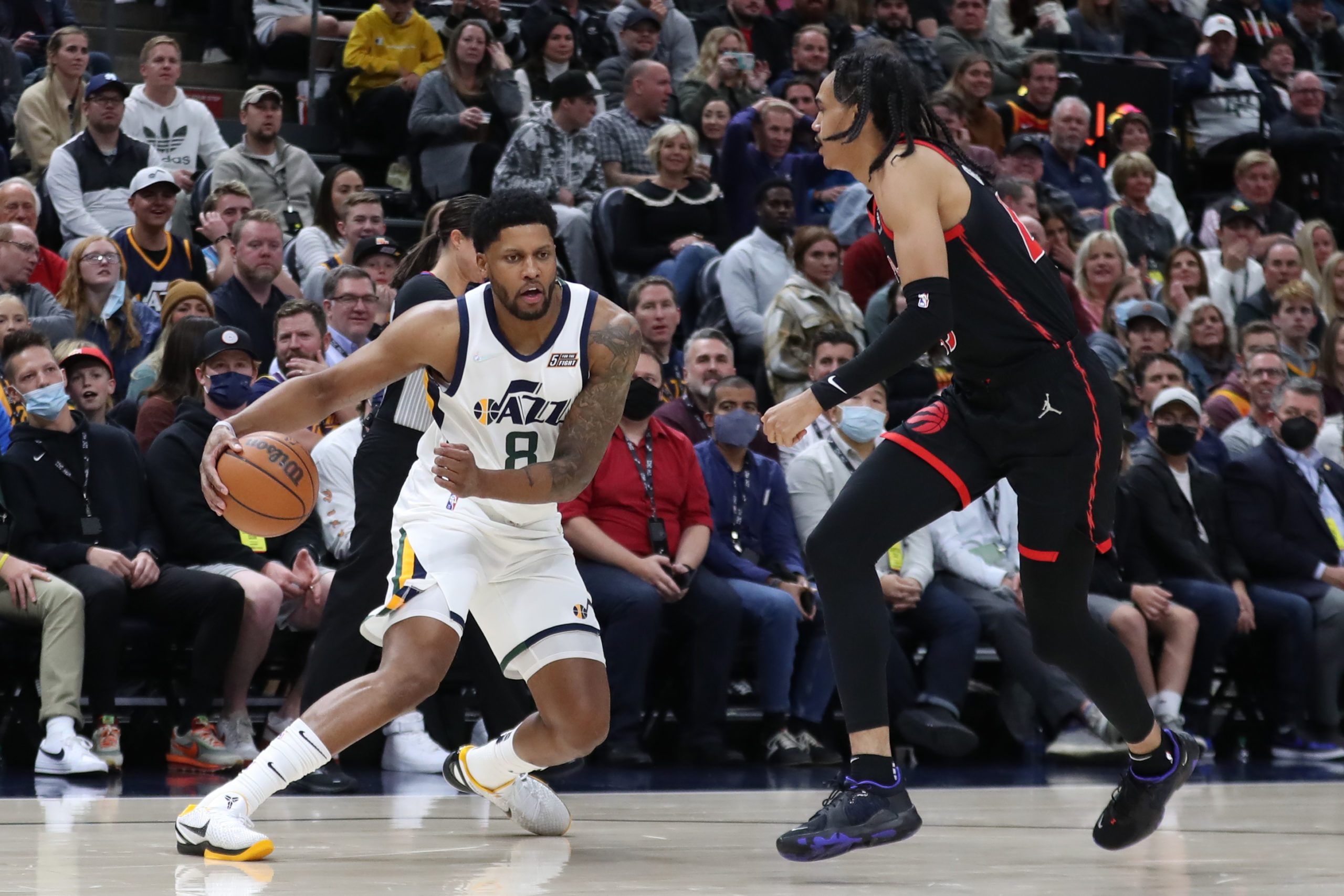 Utah Jazz forward Rudy Gay (8) controls the ball defended by Toronto Raptors guard Dalano Banton (45) in the fourth quarter at Vivint Arena.