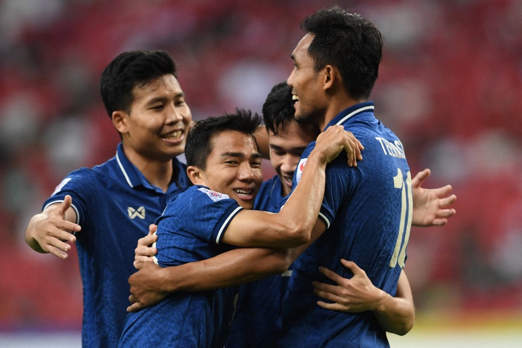 with teammates after scoring during the first leg of the AFF Suzuki Cup 2020 football final match between Indonesia and Thailand at the National Stadium in Singapore on December 29, 2021. 