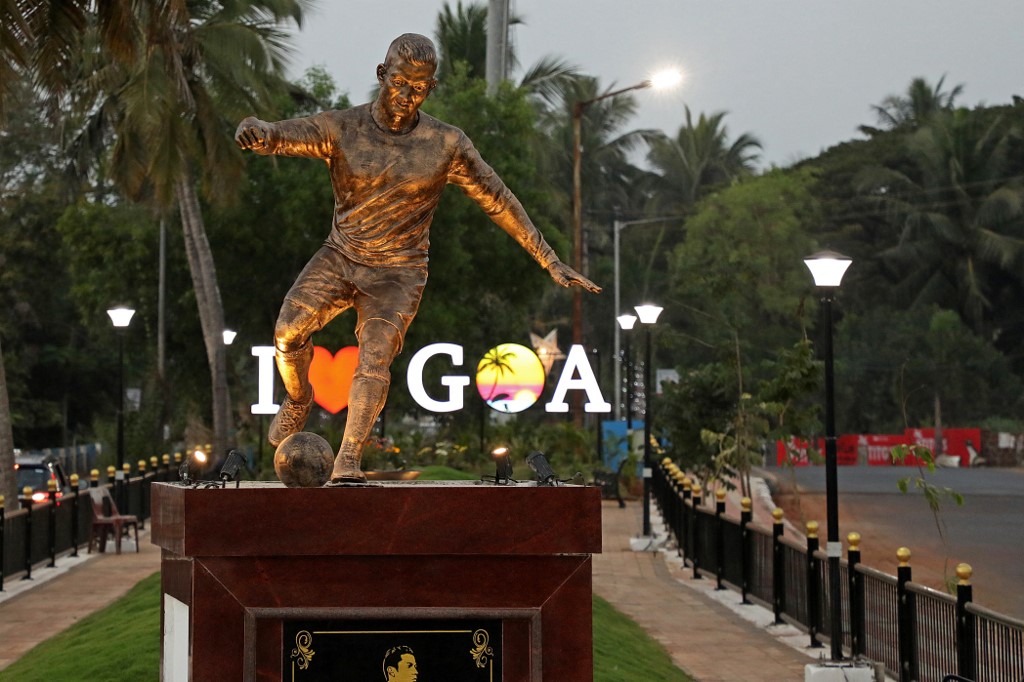This photograph taken on December 30, 2021 shows a newly installed statue of Portuguese footballer Cristiano Ronaldo in Calangute after the statue has caused a stir, this time in Goa, the southern Indian state that was a Portuguese colony until 60 years ago.