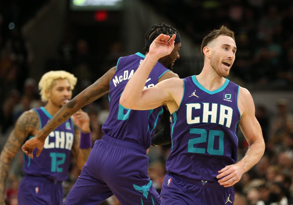 Gordon Hayward #20 of the Charlotte Hornets celebrates with teammates after a basket in the second half at AT&T Center on December 15 2021 in San Antonio, Texas. 