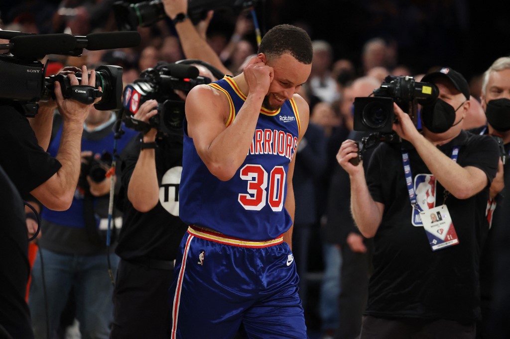 Stephen Curry #30 of the Golden State Warriors looks on after making a three point basket to break Ray Allens record for the most all-time against the New York Knicks during their game at Madison Square Garden on December 14, 2021 in New York City. 