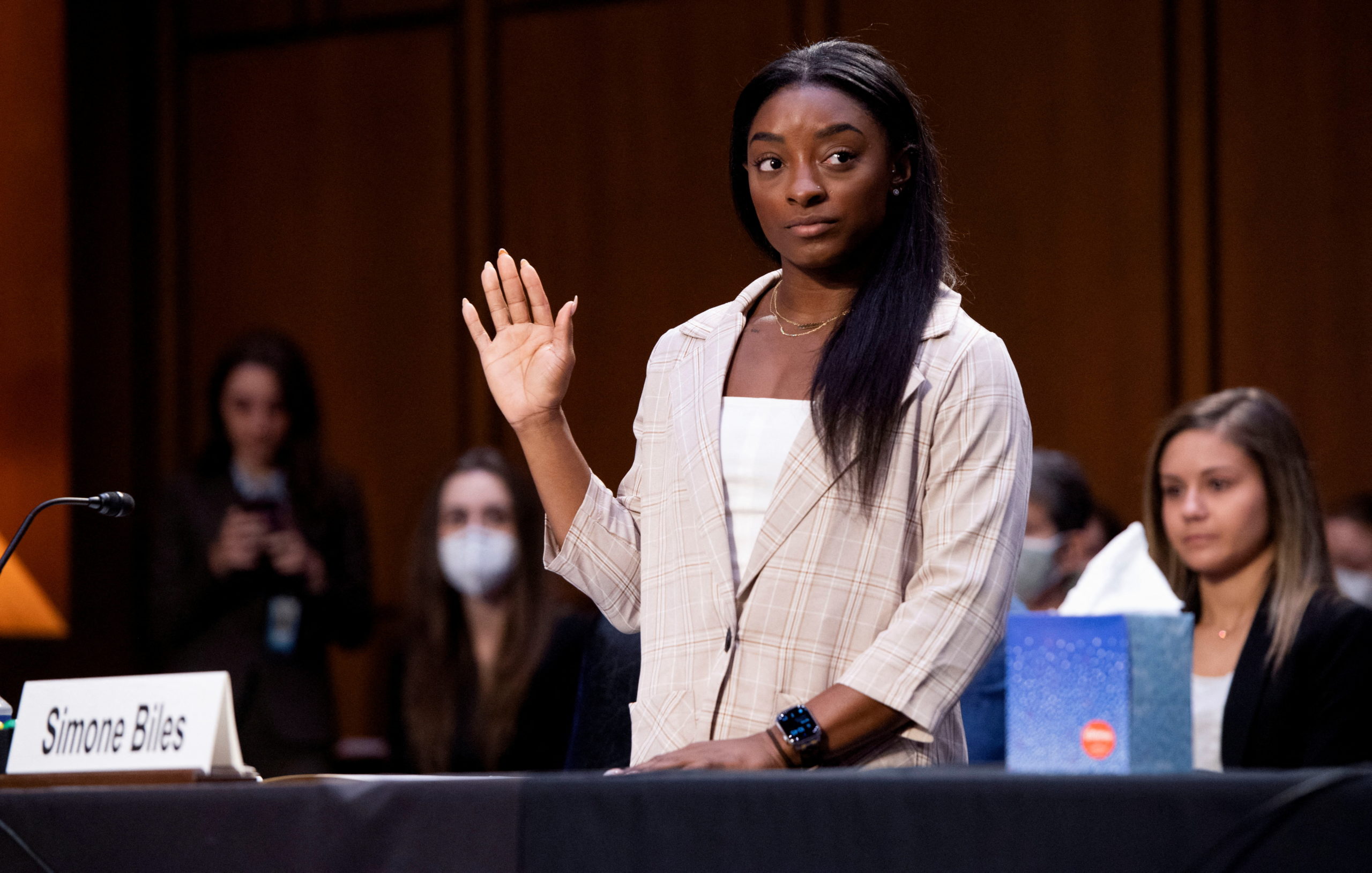 FILE PHOTO: U.S. Olympic gymnast Simone Biles is sworn in to testify during a Senate Judiciary hearing about the Inspector General's report on the FBI handling of the Larry Nassar investigation of sexual abuse of Olympic gymnasts, on Capitol Hill, in Washington, D.C., U.S., September 15, 2021. Saul Loeb/Pool via REUTERS