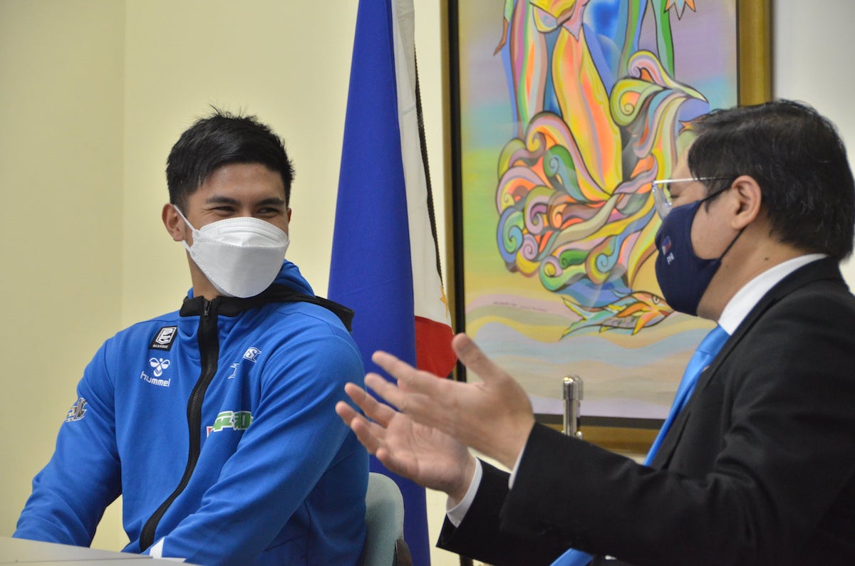 Filipino import Kiefer Ravena with Deputy Ambassador Robespierre Bolivar. 