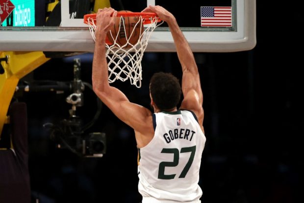 (FILES) In this file photo taken on January 17, 2022 Rudy Gobert #27 of the Utah Jazz dunks the ball during the second quarter against the Los Angeles Lakers at Crypto.com Arena in Los Angeles, California. - "We are currently seeing the best Rudy Gobert who has ever been", confides to AFP the French pivot, author of his best NBA season with the Jazz, of which he is asserting himself more and more as a leader.