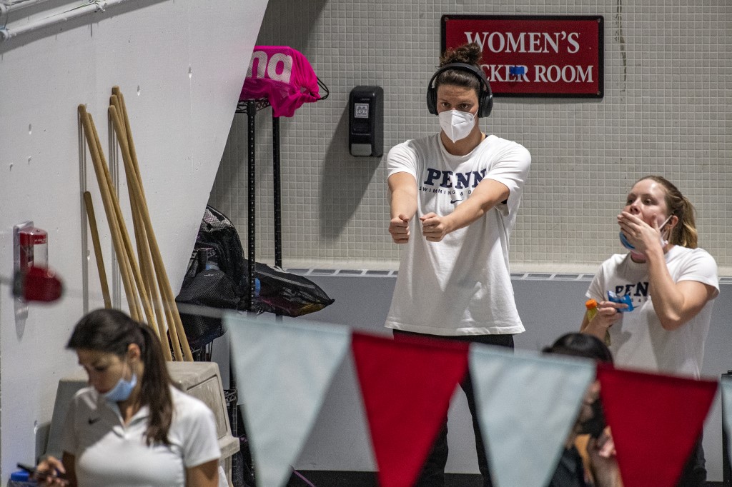 r woman, warms up before swimming for the University of Pennsylvania at an Ivy League meet against Harvard University in Cambridge, Massachusetts, on January 22, 2022.