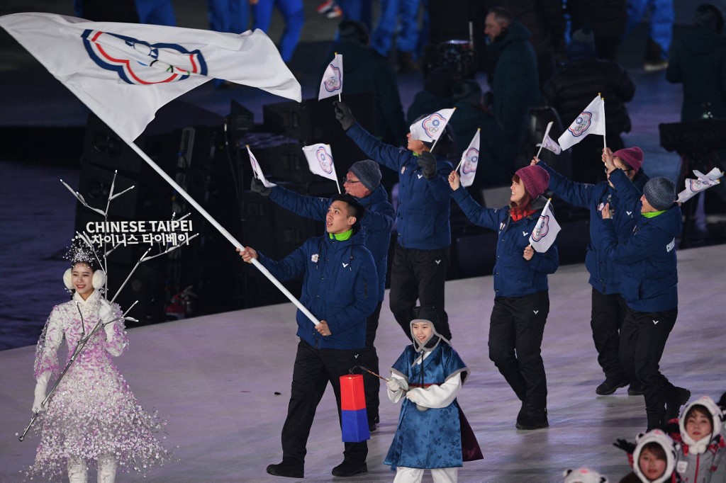 Taiwans flagbearer Lien Te-An leads the delegation parade during the opening ceremony of the Pyeongchang 2018 Winter Olympic Games at the Pyeongchang Stadium on February 9, 2018. (