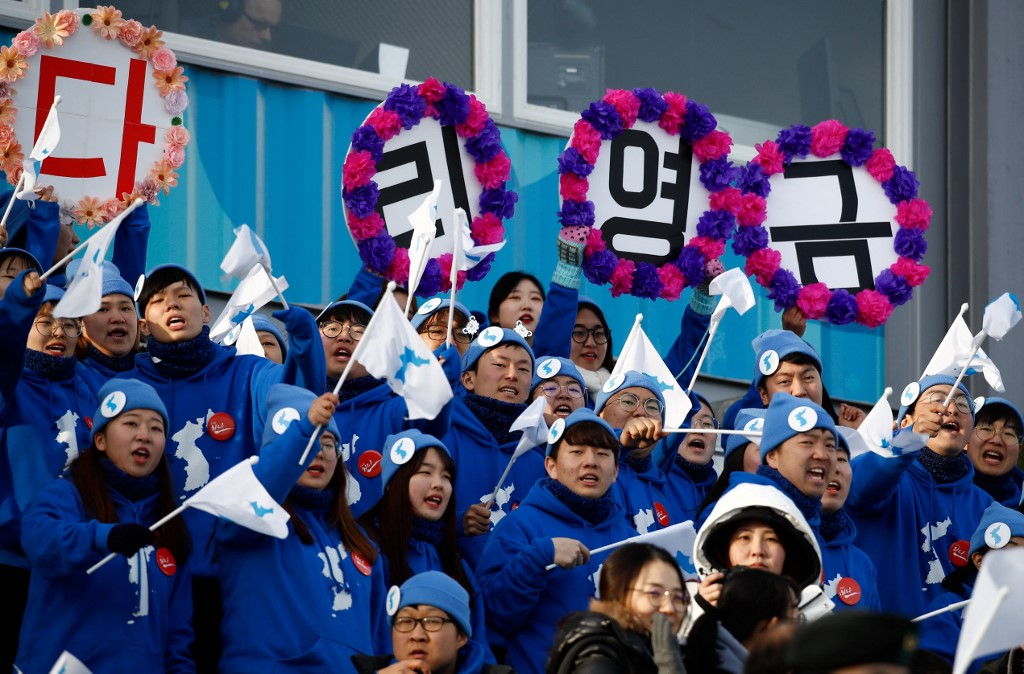 North Korean cheerleaders attend the women's 10km freestyle cross-country event at the Alpensia cross country ski centre during the Pyeongchang 2018 Winter Olympic Games on February 15, 2018 in Pyeongchang. 