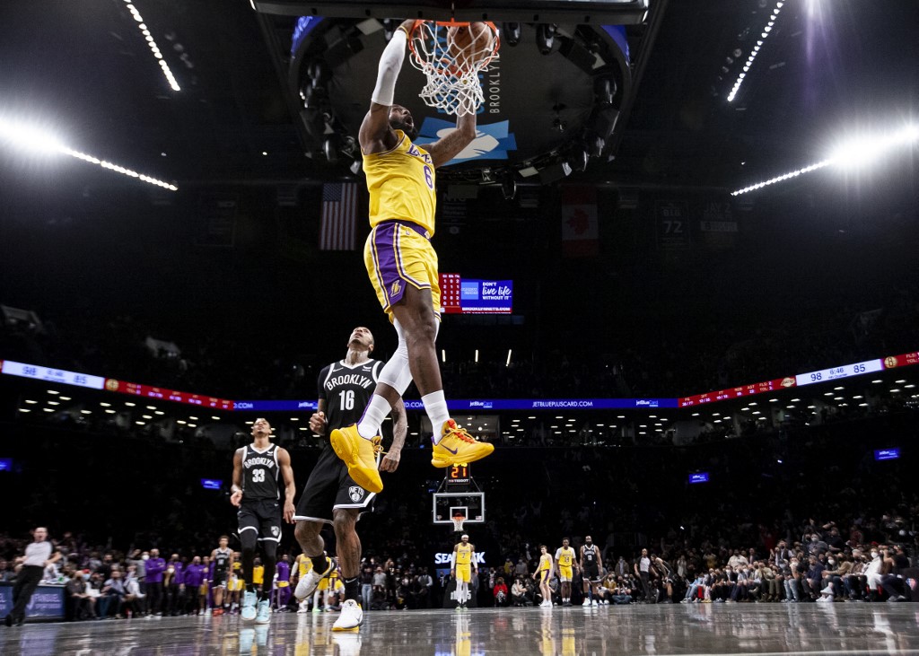  LeBron James #6 of the Los Angeles Lakers dunks against the Brooklyn Nets at Barclays Center on January 25, 2022 in the Brooklyn borough of New York City. 