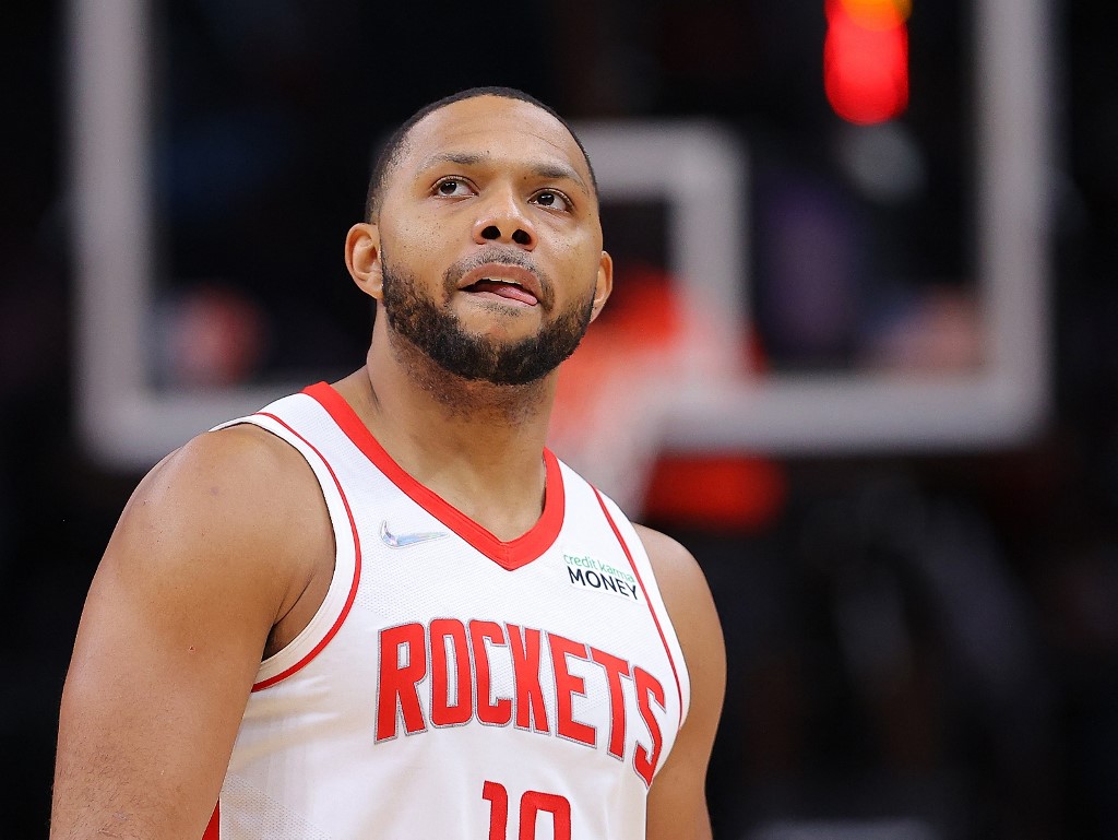 Eric Gordon #10 of the Houston Rockets reacts after hitting a three-point basket against the Atlanta Hawks during the second half at State Farm Arena on December 13, 2021 in Atlanta, Georgia. 