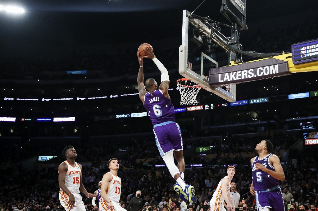 LeBron James #6 of the Los Angeles Lakers dunks against the Atlanta Hawks in the second half at Crypto.com Arena on January 07, 2022 in Los Angeles, California.