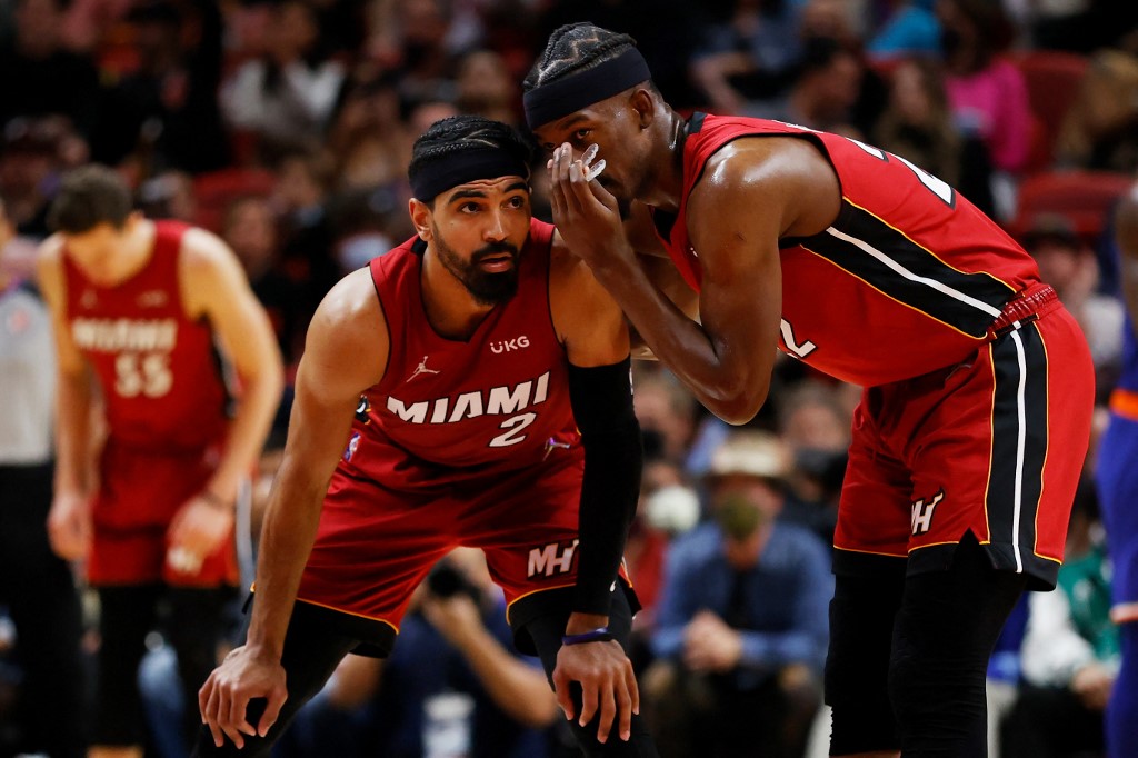 Jimmy Butler #22 talks to Gabe Vincent #2 of the Miami Heat in the second half against the New York Knicks at FTX Arena on January 26, 2022 in Miami, Florida. 