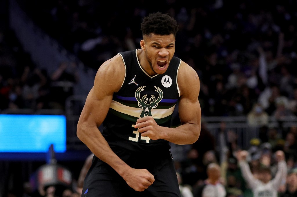 MILWAUKEE, WISCONSIN - JANUARY 28: Giannis Antetokounmpo #34 of the Milwaukee Bucks reacts to a three point shot against the New York Knicks during the fourth quarter at Fiserv Forum on January 28, 2022 in Milwaukee, Wisconsin.
