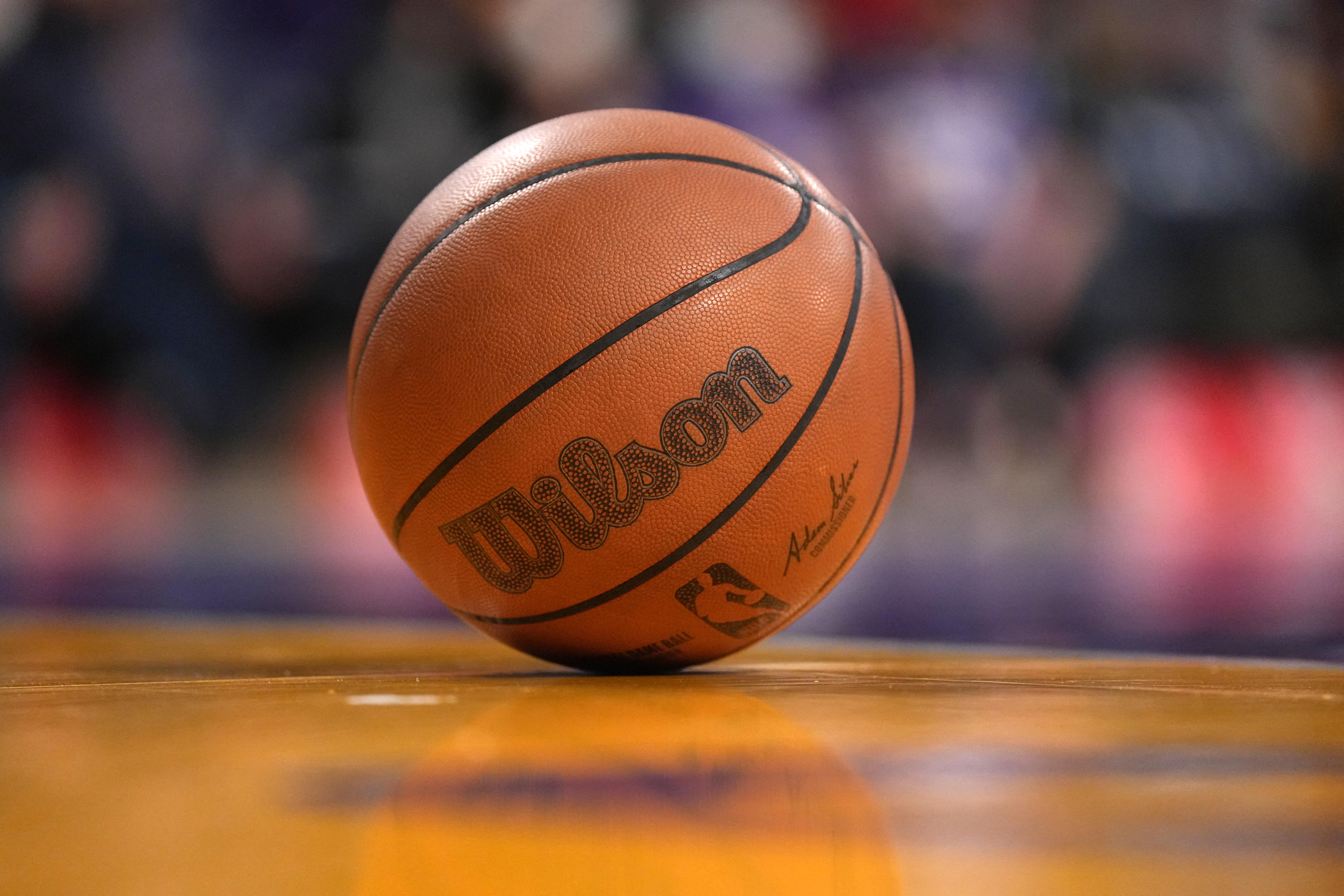 FILE PHOTO: A detailed view of a Wilson official NBA basketball on the court at Crypto.com Arena.