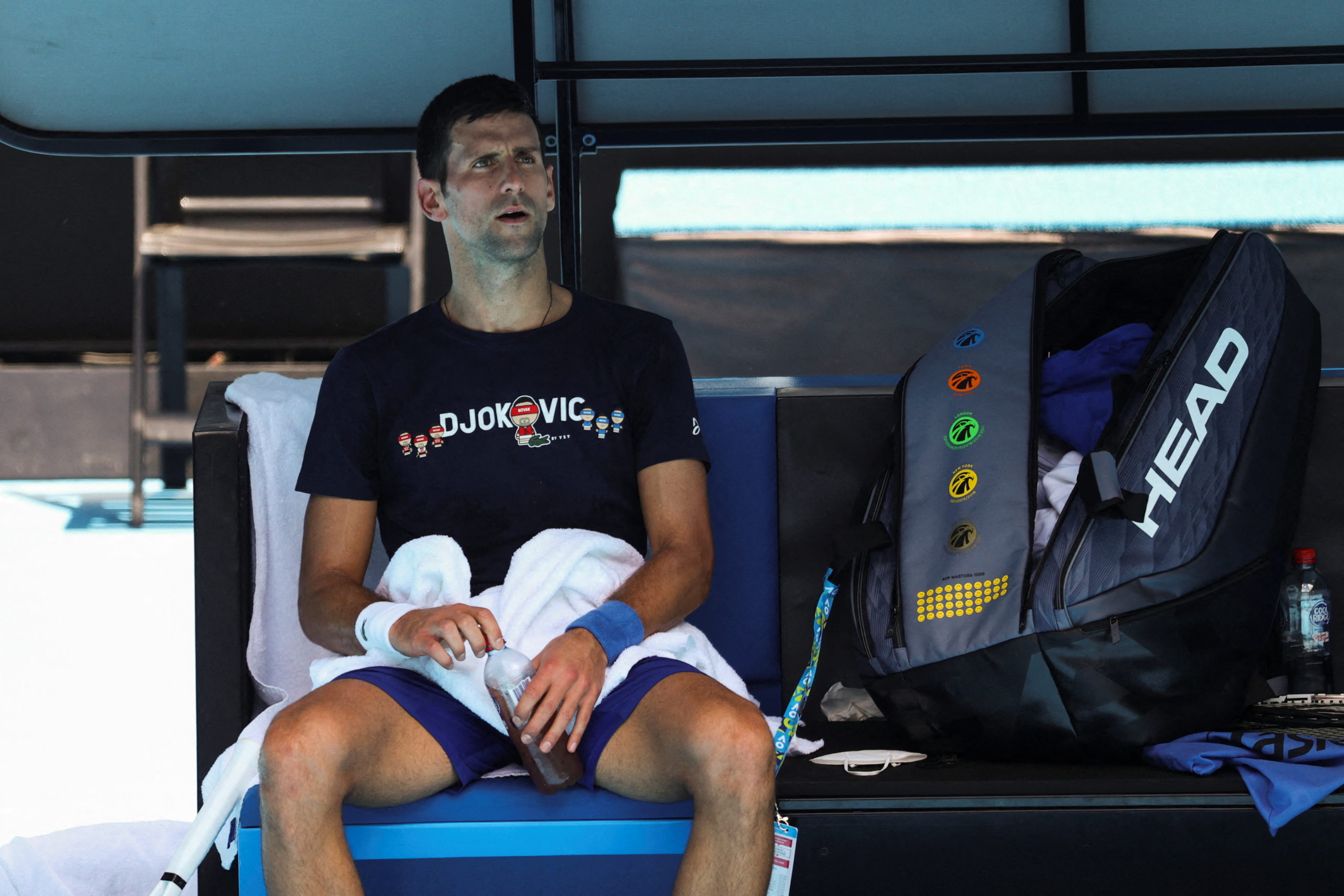 Serbian tennis player Novak Djokovic rests at Melbourne Park as questions remain over the legal battle regarding his visa to play in the Australian Open in Melbourne, Australia, January 12, 2022.