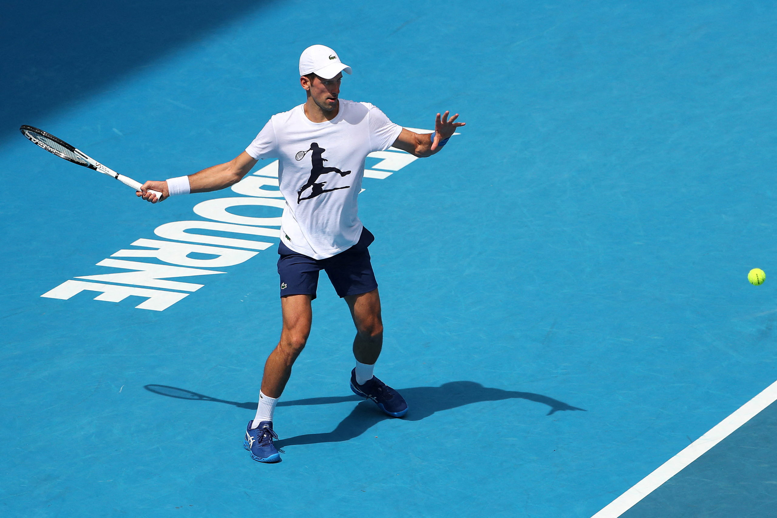 Serbian tennis player Novak Djokovic practices on Rod Laver Arena ahead of the 2022 Australian Open at Melbourne Park, in Melbourne, Australia, January 11, 2022. 