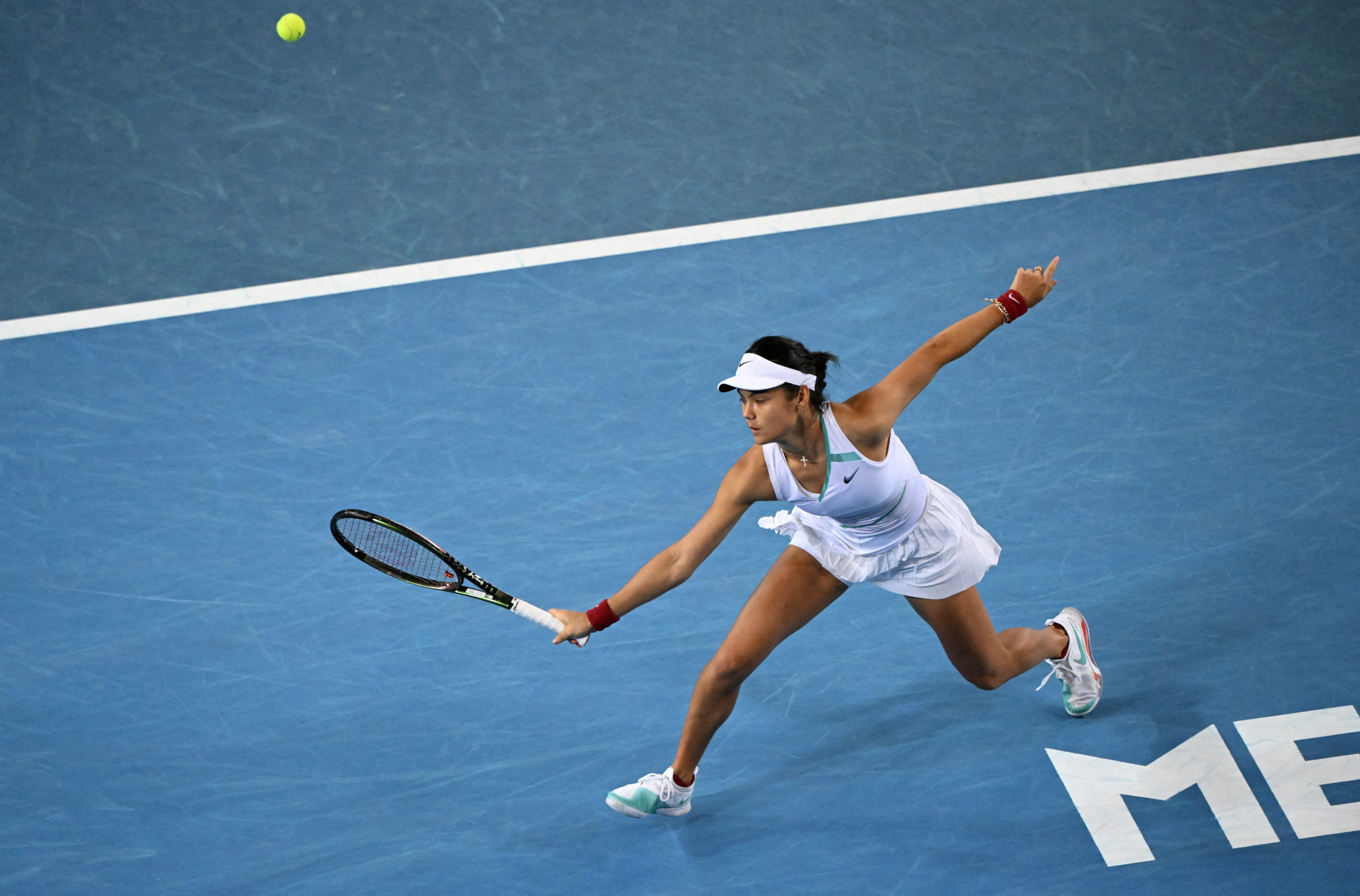 Britain's Emma Raducanu in action during her first round match against Sloane Stephens of the U.S. 