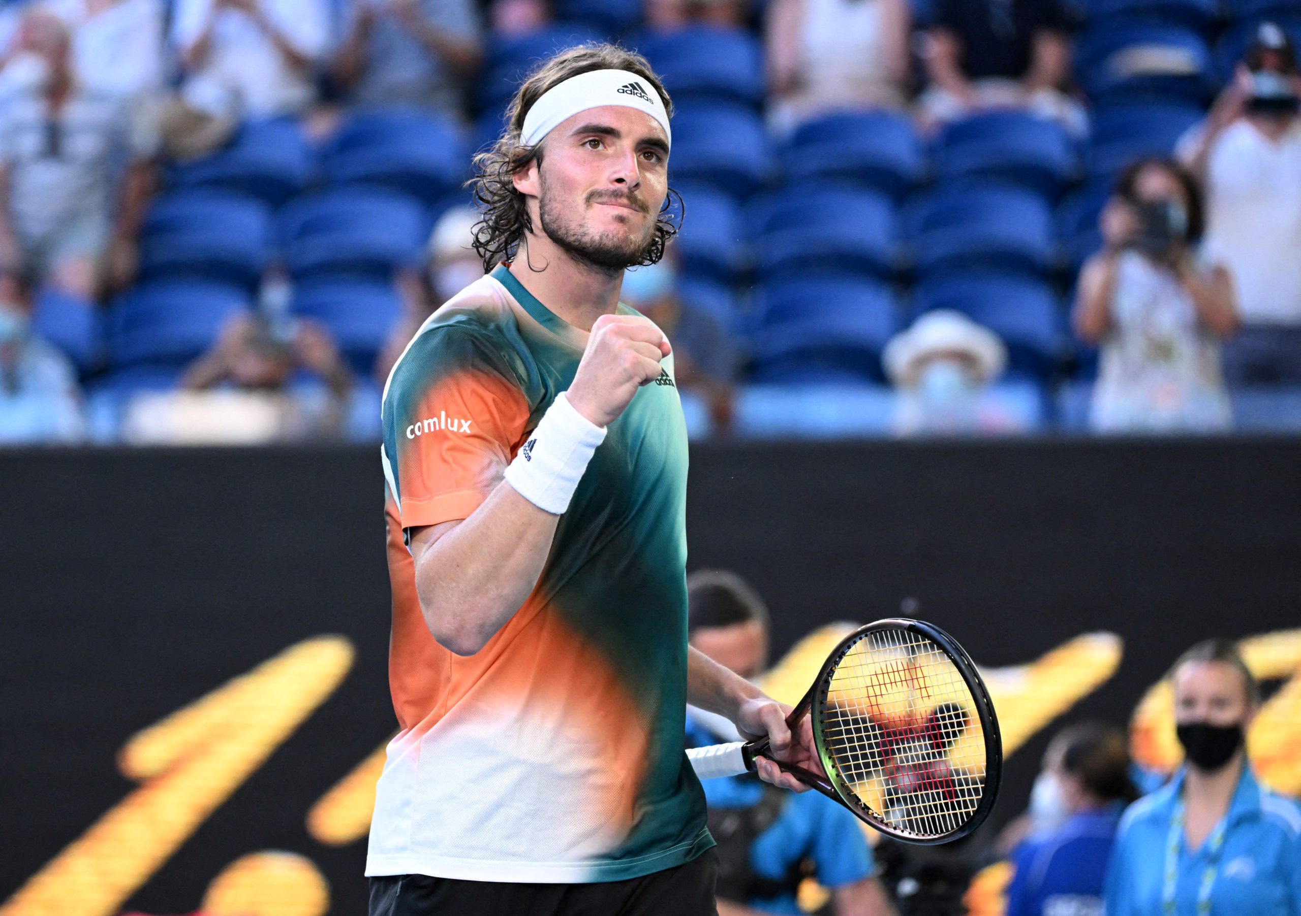 Tennis - Australian Open - Melbourne Park, Melbourne, Australia - January 22, 2022 Greece's Stefanos Tsitsipas celebrates winning his third round match against France's Benoit Paire 