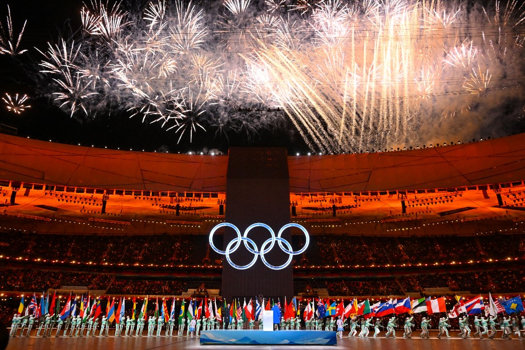Fireworks explode over the Olympic rings during the opening ceremony of the Beijing 2022 Winter Olympic Games, at the National Stadium, known as the Bird's Nest, in Beijing, on February 4, 2022. (
