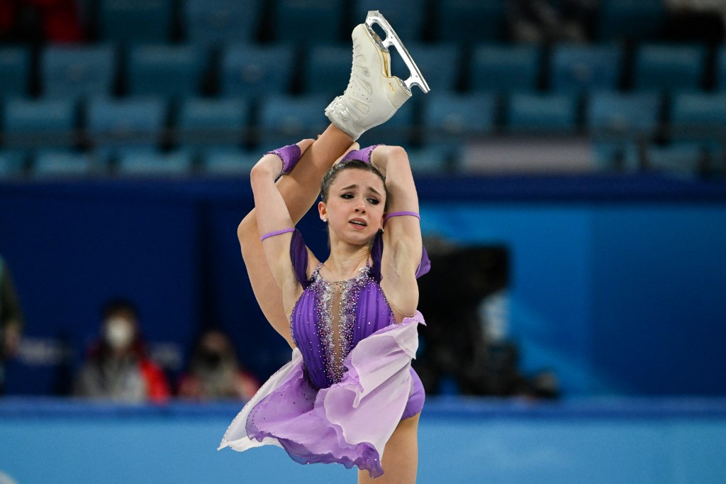 Russia's Kamila Valieva competes in the women's single skating short program of the figure skating team event during the Beijing 2022 Winter Olympic Games at the Capital Indoor Stadium in Beijing on February 6, 2022. 