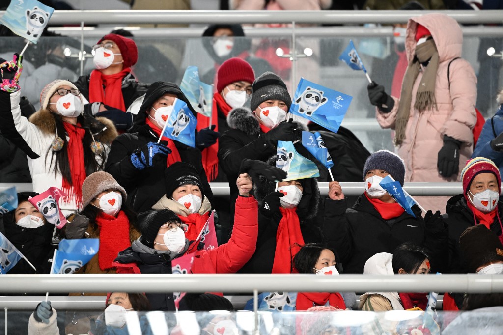 Fans cheer during the Ski Jumping Mixed Team Final, on February 07, 2022 at the Zhangjiakou National Ski Jumping Centre, during the Beijing 2022 Winter Olympic Games.