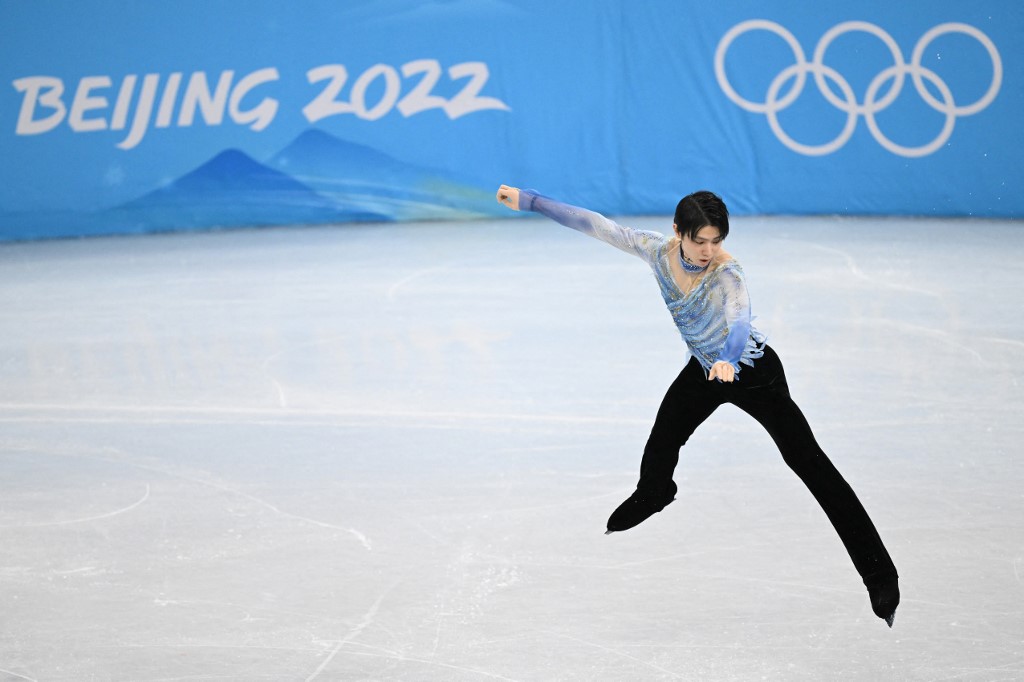 Japan's Yuzuru Hanyu competes in the men's single skating short program of the figure skating event during the Beijing 2022 Winter Olympic Games at the Capital Indoor Stadium in Beijing on February 8, 2022.