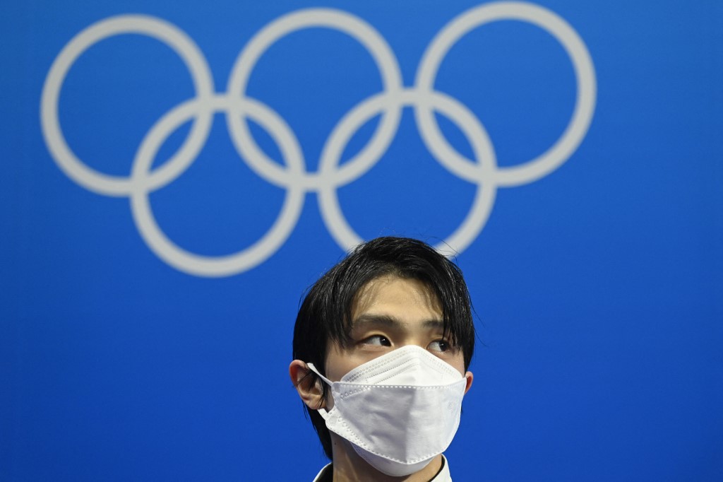 Japan's Yuzuru Hanyu reacts after competing in the men's single skating short program of the figure skating event during the Beijing 2022 Winter Olympic Games at the Capital Indoor Stadium in Beijing on February 8, 2022. 