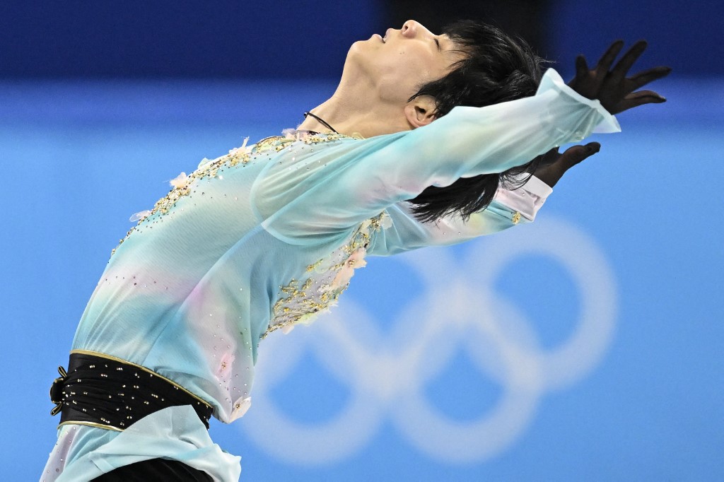 Japan's Yuzuru Hanyu competes in the men's single skating free skating of the figure skating event during the Beijing 2022 Winter Olympic Games at the Capital Indoor Stadium in Beijing on February 10, 2022. 