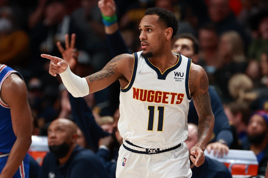 Monte Morris #11 of the Denver Nuggets reacts after a made basket against the New York Knicks in the first half at Ball Arena on February 8, 2022 in Denver, Colorado.