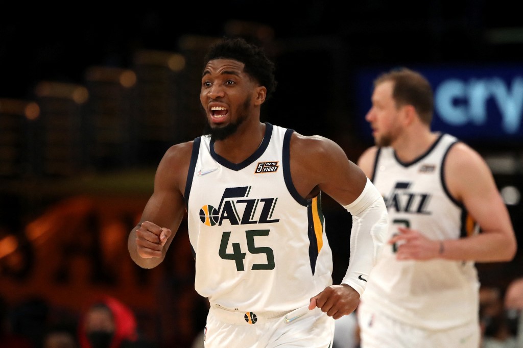 Donovan Mitchell #45 of the Utah Jazz reacts to a play during the first quarter against the Los Angeles Lakers at Crypto.com Arena on January 17, 2022 in Los Angeles, California.