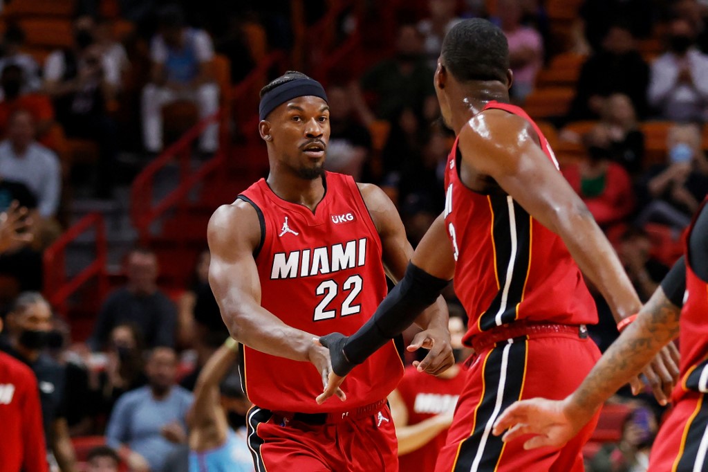 FILE–Jimmy Butler #22 of the Miami Heat celebrates against the New York Knicks in the first half at FTX Arena on January 26, 2022 in Miami, Florida. 