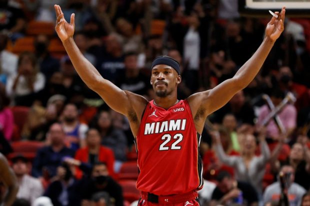 MIAMI, FLORIDA - JANUARY 26: Jimmy Butler #22 of the Miami Heat gestures to the crowd in the second half against the New York Knicks at FTX Arena on January 26, 2022 in Miami, Florida. NOTE TO USER: User expressly acknowledges and agrees that, by downloading and or using this photograph, User is consenting to the terms and conditions of the Getty Images License Agreement.