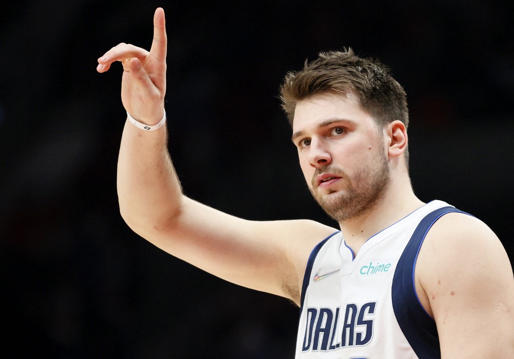  Luka Doncic #77 of the Dallas Mavericks reacts during the first quarter against the Portland Trail Blazers at Moda Center on January 26, 2022 in Portland, Oregon.