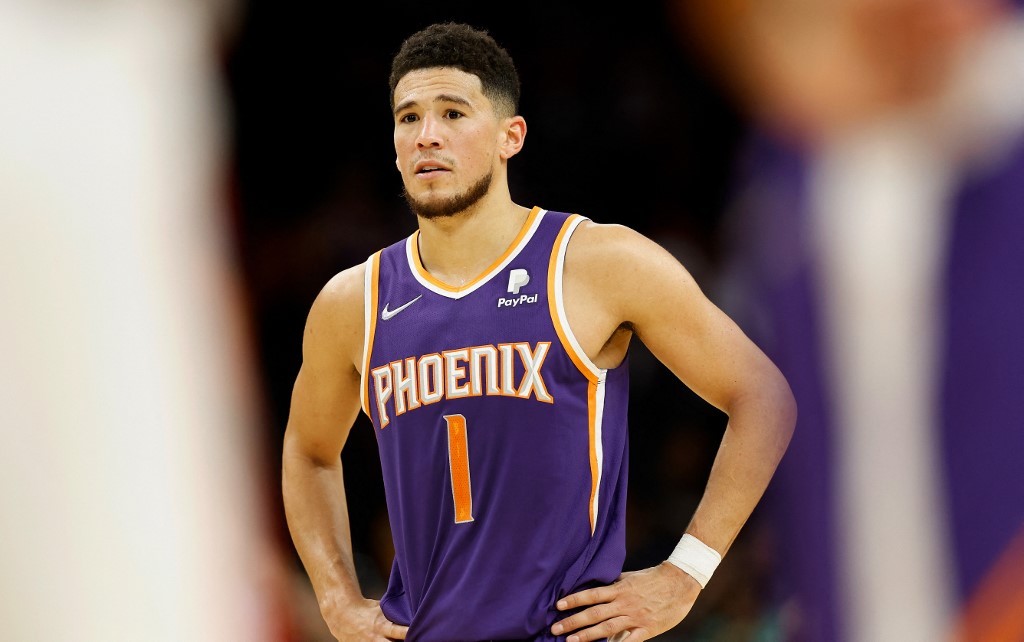 Devin Booker #1 of the Phoenix Suns reacts during the second half of the NBA game against the Houston Rockets at Footprint Center on February 16, 2022 in Phoenix, Arizona. The Suns defeated the Rockets 124-121.