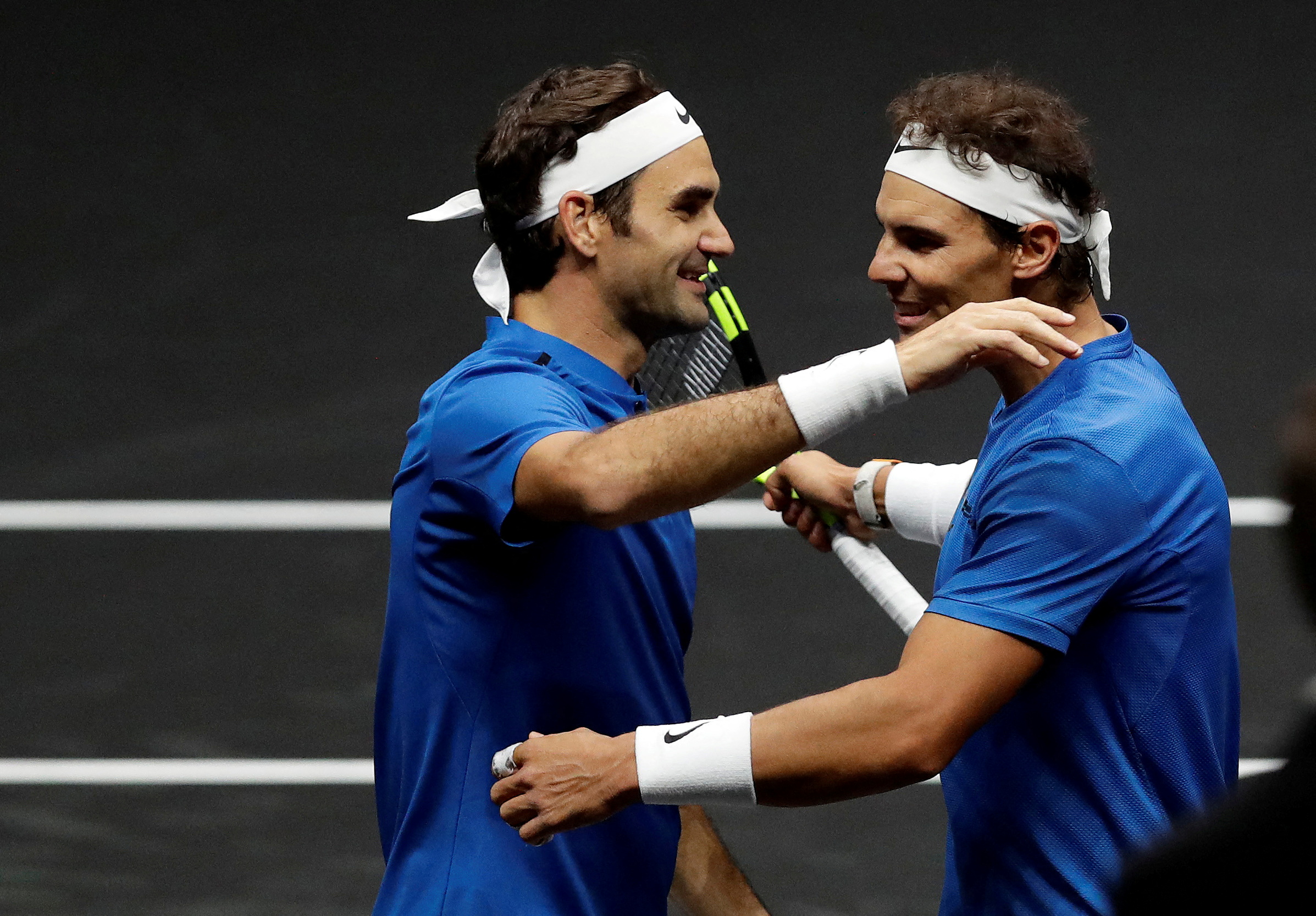 FILE PHOTO: Tennis - Laver Cup - 2nd Day - Prague, Czech Republic - September 23, 2017 - Rafael Nadal and Roger Federer of team Europe celebrate after winning the match. 