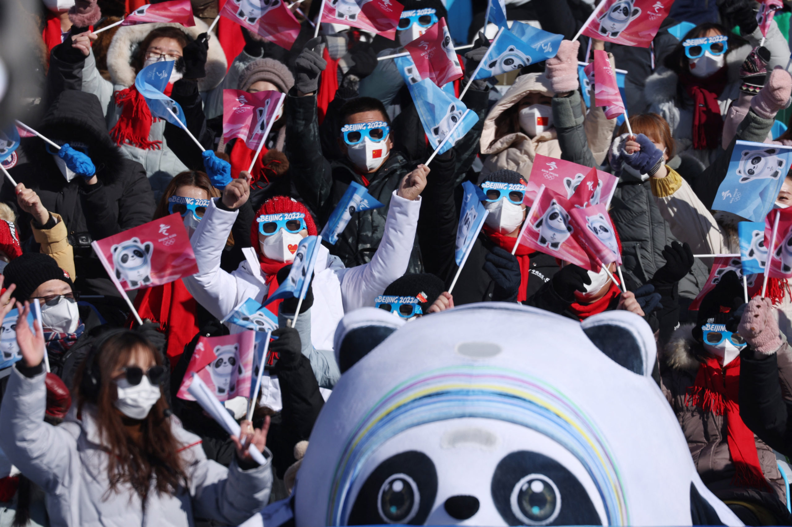 2022 Beijing Olympics - Snowboard - Women's Parallel Giant Slalom 1/8 Finals - Genting Snow Park, Zhangjiakou, China - February 8, 2022. Spectators wearing masks before the start of the event. R
